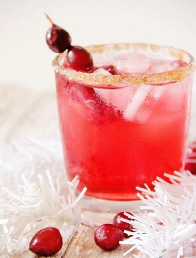 Comfort Food - cranberry fizz mocktail with sugared rim and fresh cranberries