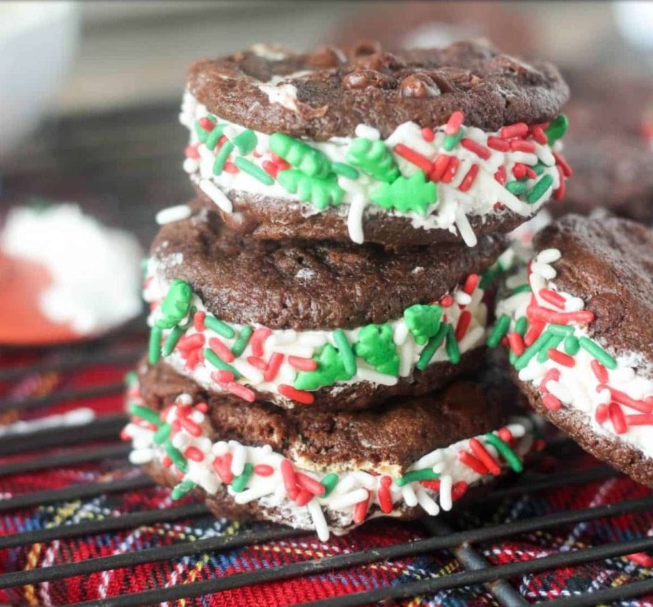 a stack of sandwich cookies - chocolate wafers, marshmallow buttercream, sprinkles