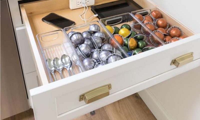 Kitchen drawer charging station with electrical outlet in rear