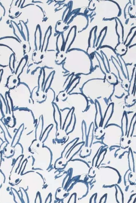 blue and white wallpaper with 3-foot rabbits