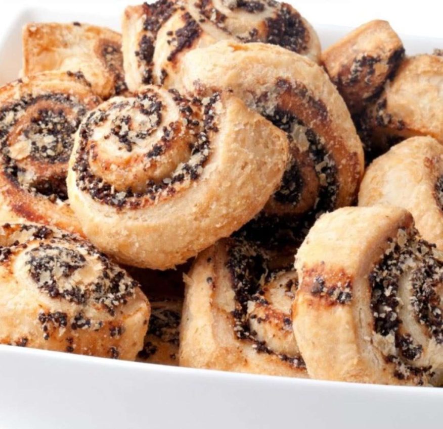 a box of pinwheel cookies that look like mini cinnamon rolls
