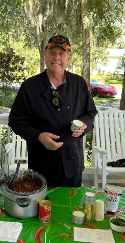 Our Neighbor Thomas posing with his chili