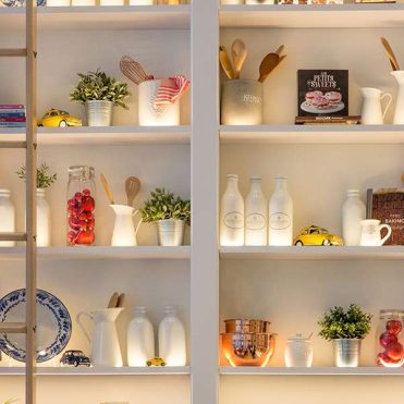 Styled pantry shelves beautifully arranged