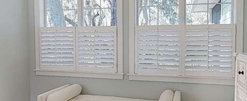 White divan with matching bolster pillows