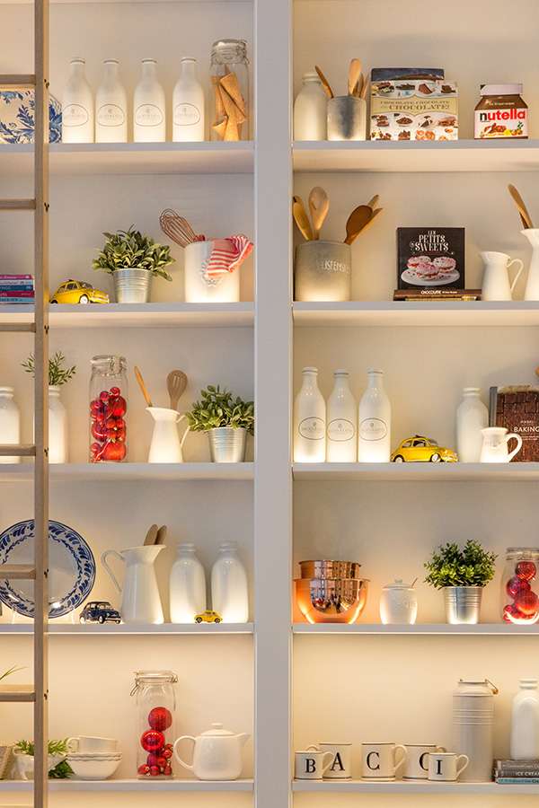 Styled pantry shelves beautifully arranged