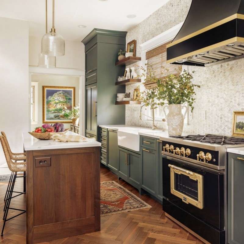 Pretty kitchen with brown and green cabinetry